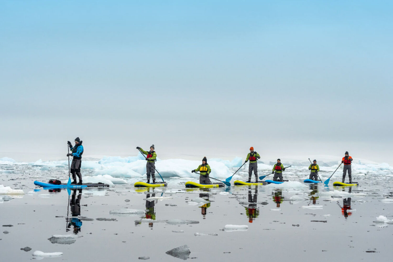 Scenic Eclipse Antarctica Guests paddleboarding at Fish Islands
