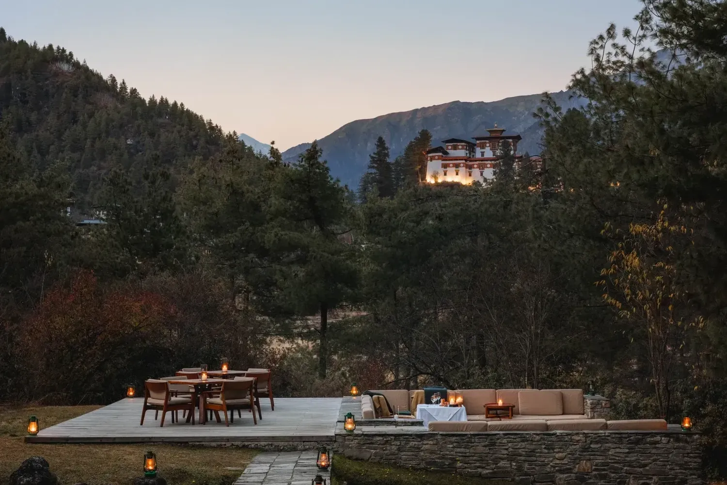 Amankora Bhutan Paro Lodge Exterior firepit terrace Drukgyel Dzong view 46848 cropped