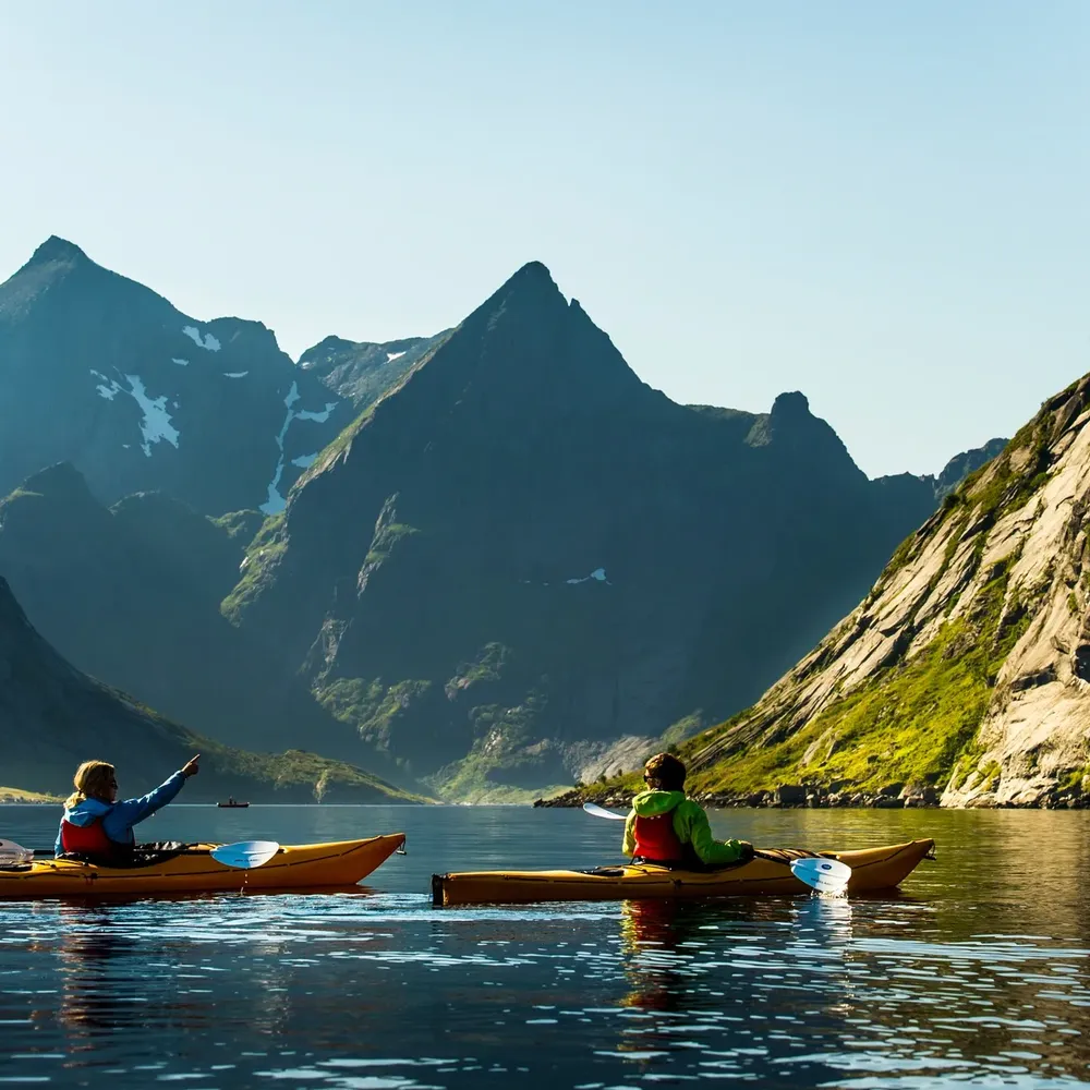 Kayaking in Reinefjorden Reine in the Lofoten islands CH Visit Norway com